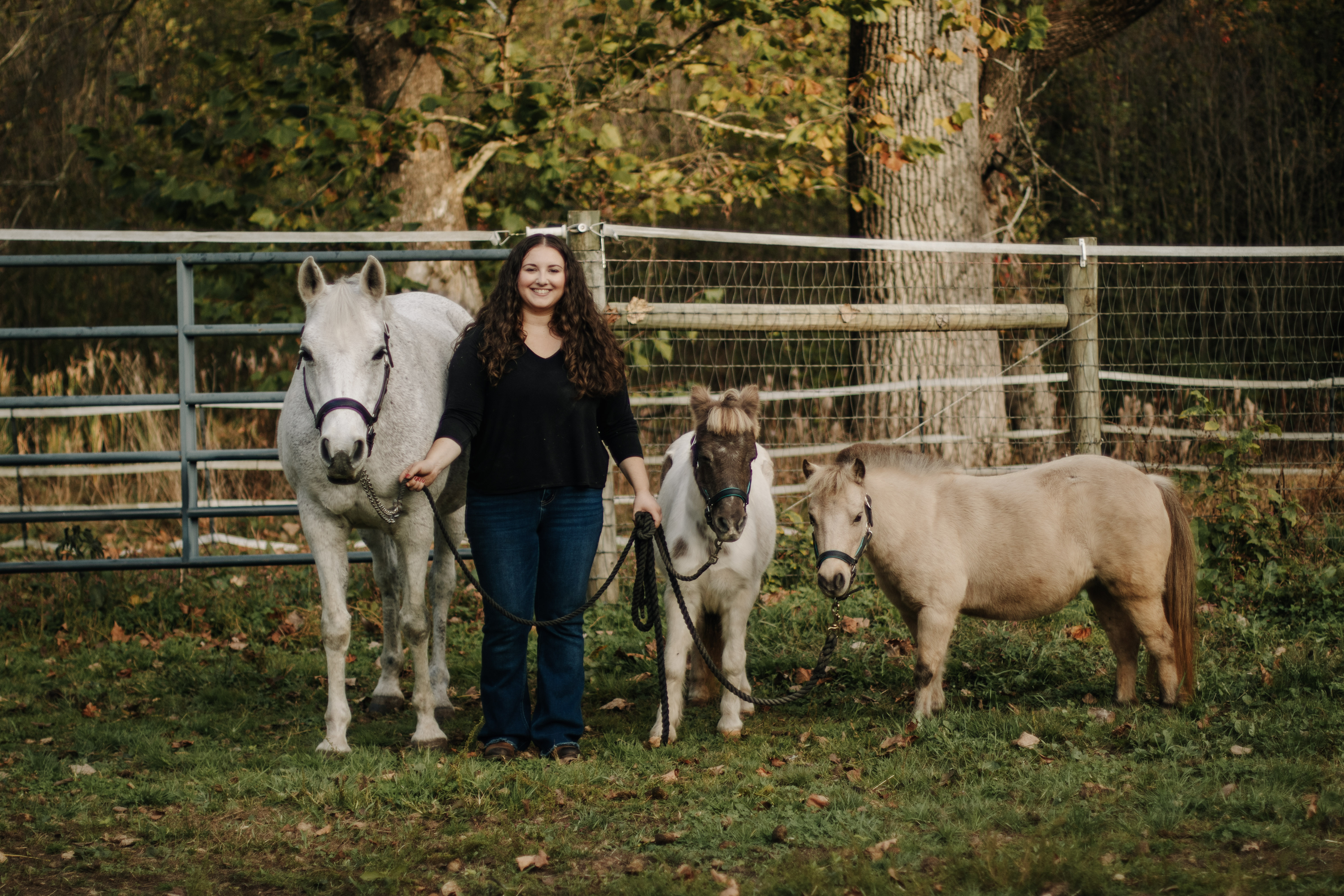 Marissa with her horses Apple, Dolly, and Gracie